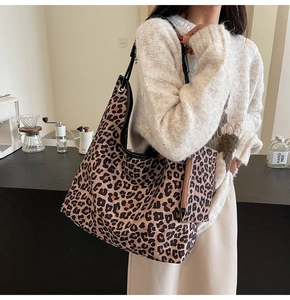 Leopard print tote bag detail showing the inner pouch and large capacity interior