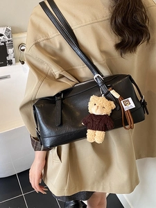 Retro black leather shoulder bag with bear pendant and adjustable silver strap