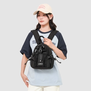 Detail showing tactical black mini backpack with mesh pocket and functional buckle strap