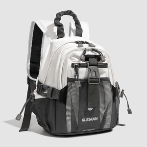 Detail view of mini monochrome backpack featuring mesh pockets and adjustable buckles
