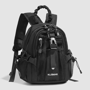 Detail view of mini outdoor backpack featuring multi-layered zippers and mesh side pockets