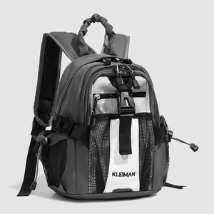 Detail of multi-compartment mini backpack featuring durable nylon fabric and buckle straps