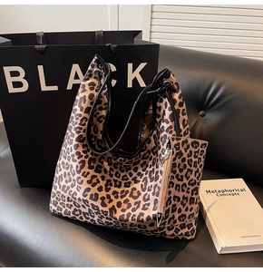 Detailed set of leopard print canvas tote bag with a matching small zipper pouch