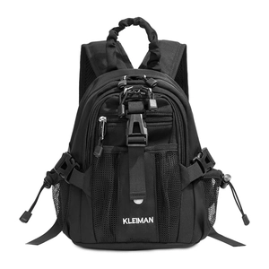 Detail of black mini backpack with durable nylon fabric, buckle straps and mesh side pockets