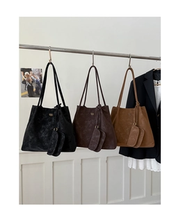 Minimalist vintage tote bags in black, coffee, and brown suede with small hanging pouches