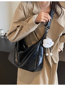 Chic black pleated hobo bag for women with cloud pendant and adjustable strap