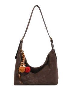 Brown frosted leather hobo bag with ethnic tassel and long strap on white background