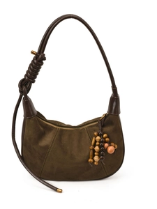Olive green suede hobo bag with brown leather strap and decorative wooden beads