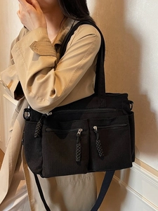 Large capacity black corduroy tote bag with dual front zipper pockets and shoulder strap