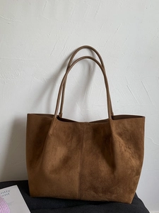 Large dark brown suede tote bag for women featuring minimalist design and twin handles