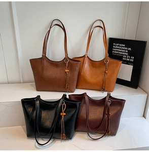 Minimalist leather tote bags in four vintage colors with stylish beaded tassel details