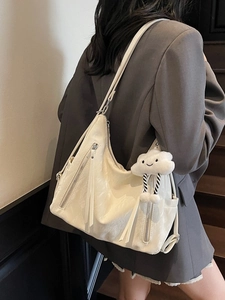 Minimalist cream white tote bag with dual front zippers and cute cloud charm detail