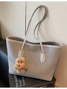 Chic grey leopard print large tote bag with bear charm and gold logo lettering