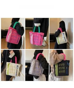 Detailed views of multi-color quilted tote bags featuring ZYS embroidery and sturdy handles