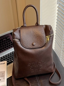 Sac à dos vintage en similicuir marron foncé avec gaufrage minimaliste et zip doré