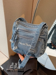 Vintage denim blue crossbody bag with multiple zip pockets and HanChao embroidery detail