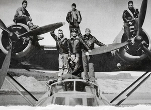 Vintage black and white photo of pilots wearing classic leather bomber flight jackets