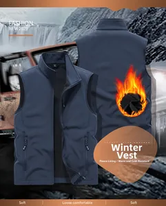 Detail of dark blue softshell vest showing warm fleece lining and windproof fabric