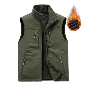 Men's reversible outdoor fleece vest in army green with thermal lining and zipper pockets