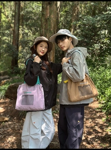 Outdoor lifestyle view of lightweight nylon tote bags with mesh pockets and sun hats