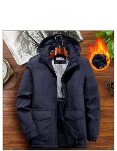 Detail of men's winter jacket showing thick black fleece lining and windproof navy fabric
