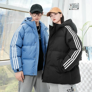 Close-up of winter hooded puffer jacket featuring triple side stripes and windproof drawstrings