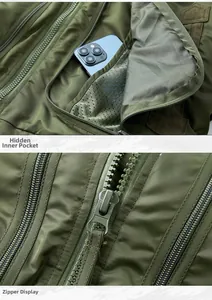 Detail of army green bomber jacket with hidden mesh pocket and sturdy metal zipper