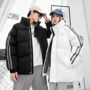 Detail of winter puffer jackets with stand collar and sleeve stripes in black and white