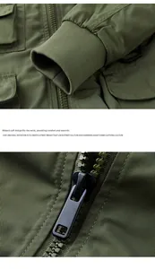Detail view of rib-knit cuffs and metal zipper on this army green tactical military jacket
