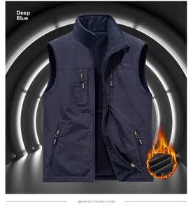 Detail of reversible thermal vest with fleece lining and multiple zipper pockets