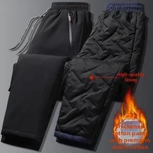 Detail of premium down cotton lining on men's quilted thermal trousers in black