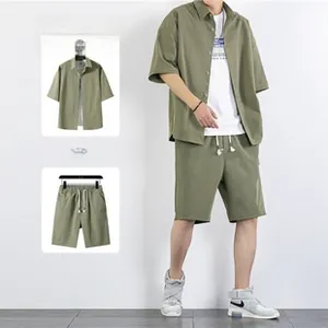 Detail view of olive green corduroy short-sleeve shirt and drawstring shorts set