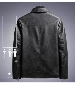 Detail view of the back of a black leather jacket featuring metal zippers and premium texture