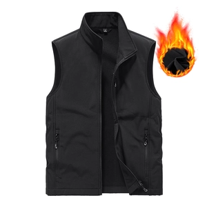 Waterproof softshell vest for men featuring a warm fleece lining and stand-up collar