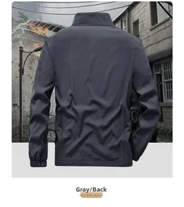 Rear view of a grey outdoor camping jacket with elastic cuffs and windproof fabric