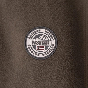 Detailed close-up of a high-quality outdoor jacket sleeve with a Norway brand badge