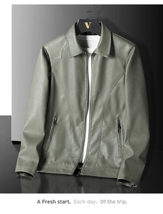 Detail of premium green PU leather jacket showing collar, zipper pockets and grain texture