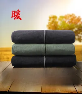 Folded corduroy jackets in black, green, gray, and brown colors with zip-up details