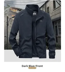 Detail of dark blue men outdoor hiking jacket featuring stand collar and zipper closure