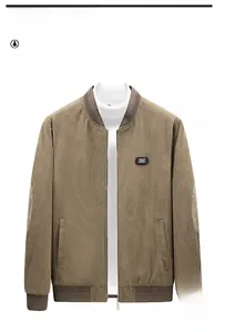 Detailed texture of khaki corduroy jacket featuring a Free Spirit chest patch and ribbing