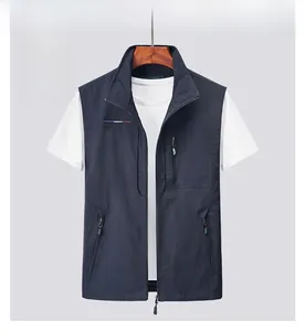 Detail of the multi-pocket fishing vest with OUTDOORWAY embroidery and zipper texture