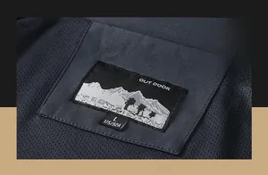 Detailed view of the outdoor jacket collar tag with mountain logo and size L label