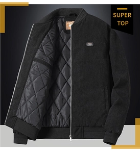 Detail of black corduroy jacket with quilted lining and Free Spirit patch embroidery
