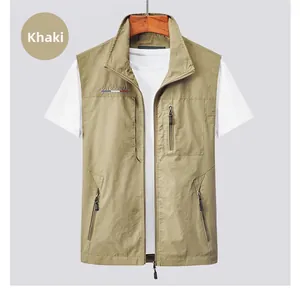 Detail of khaki outdoor fishing vest showing multi-pocket design and chest embroidery