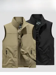 Detail view of khaki and black outdoor vests showing multi-pocket design and breathable mesh lining
