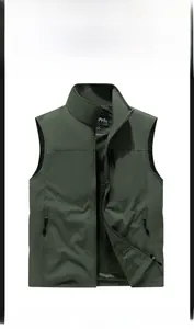 Detail of army green outdoor vest showing breathable mesh lining and zipper pockets