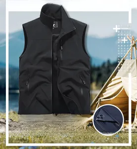 Close-up of black outdoor utility vest featuring breathable mesh lining and multi-pockets