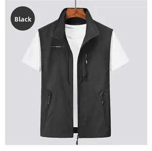 Detail of black outdoor fishing vest with multiple zipper pockets and standing collar