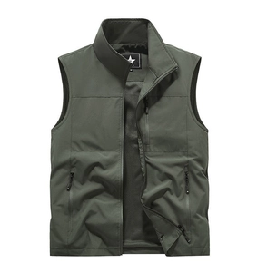 Detail of army green outdoor fishing vest with breathable mesh lining and secure zippers