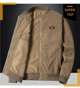 Detailed close-up of khaki corduroy bomber jacket with ribbed collar and Free Spirit patch